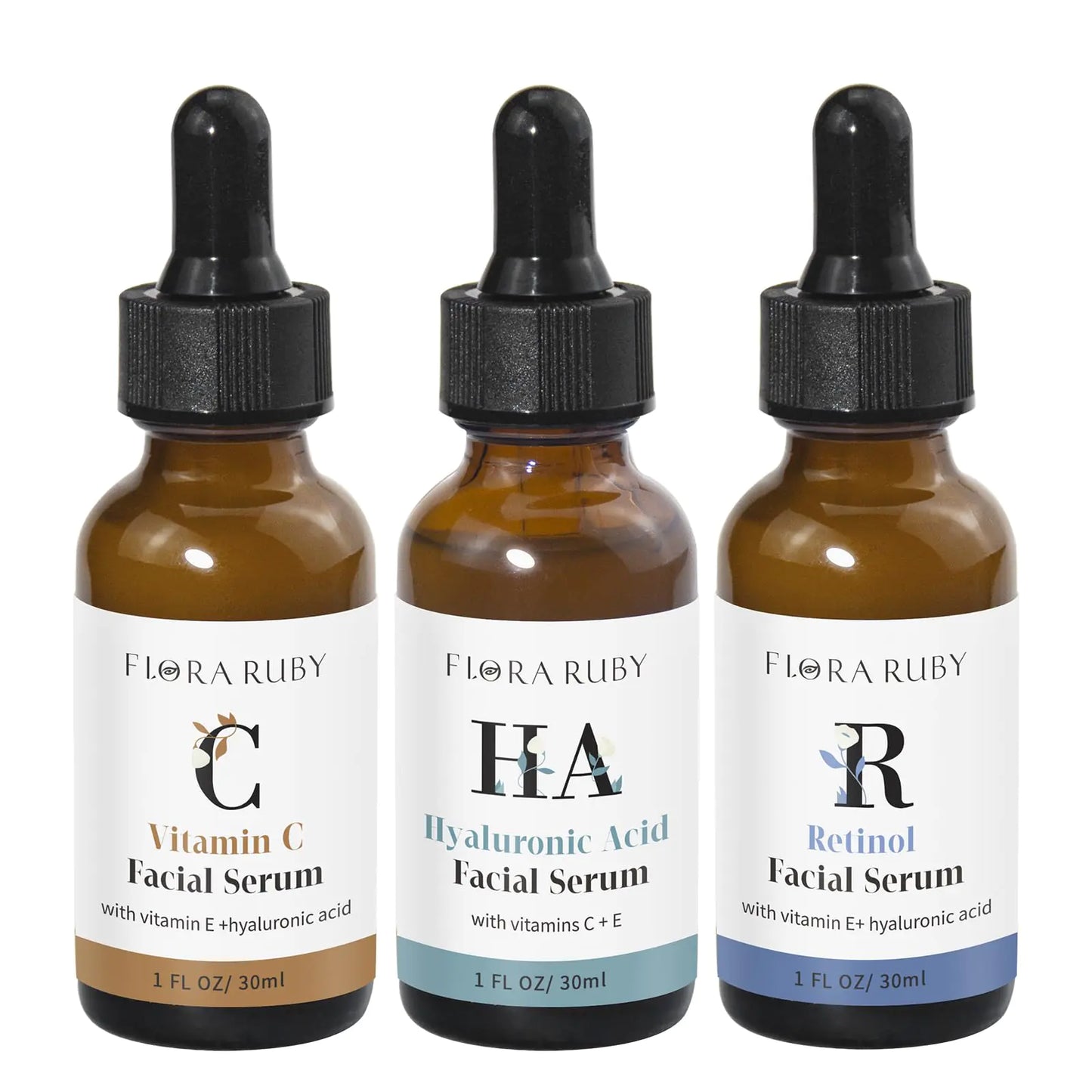 Three bottles of Flora Ruby facial serum with droppers on a white background