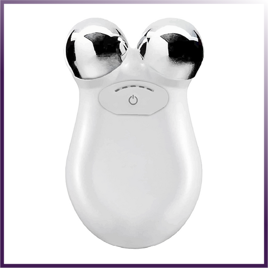 White facial massager with silver knobs on a white background
