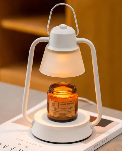 Lamp with a jar on a white base against a warm-toned background