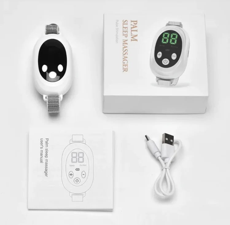 Palm sleep massager with packaging, USB cable, and user manual on a white background