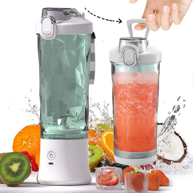 Portable blender with a green interior filled with liquid, surrounded by fruits and ice cubes on a white background.